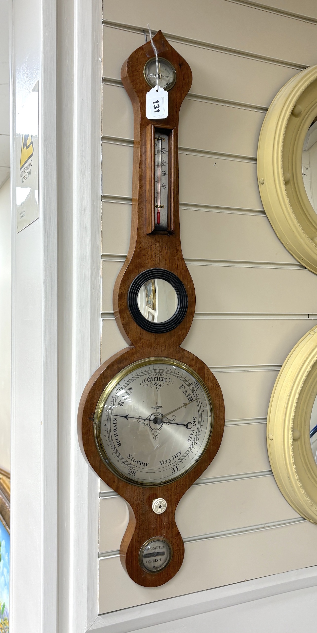 An early 19th century wheel barometer, height 93cm